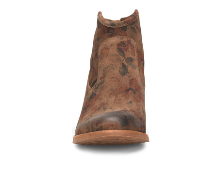 A single Sofft Aisley brown suede Chelsea-style ankle boot with a distressed floral print in muted red, green, and brown tones, shown from a front-facing perspective on a white background.