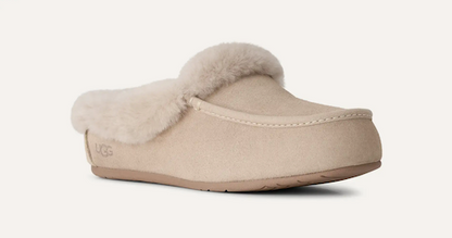 A single UGG slip-on Ansley mule in beige suede with a fluffy cream shearling lining, shown from a side profile on a light off-white background.