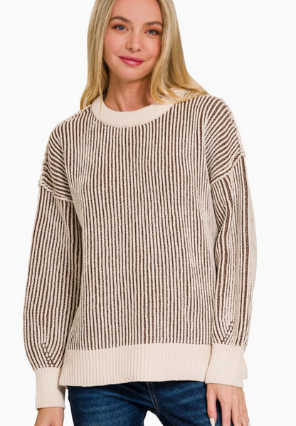 Brown two‑tone crewneck sweater with soft knit and relaxed fit.