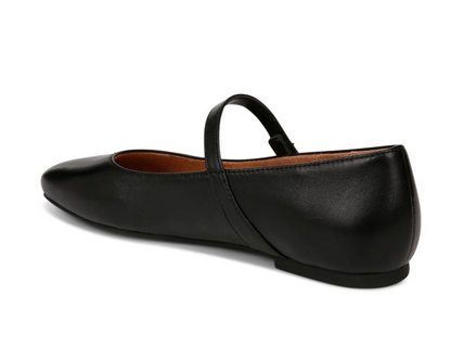 A black leather Vionic Alameda  flat with a Mary Jane strap, shown from a side-rear angle on a white background.