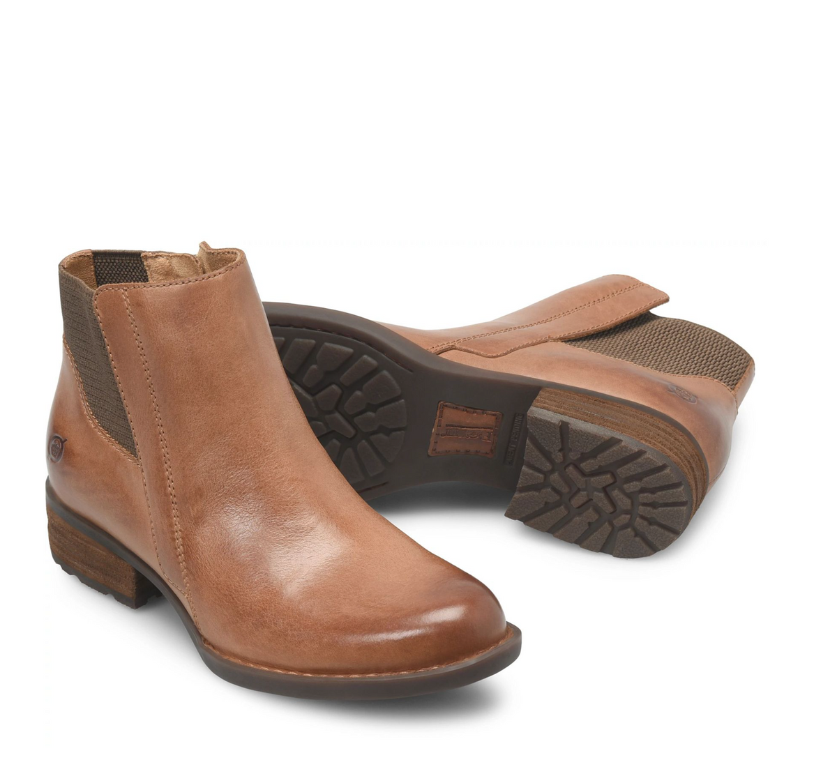 A pair of Born Kendyl tan leather Chelsea-style ankle boots with dark brown elastic side panels and soles, shown on a clean white background.