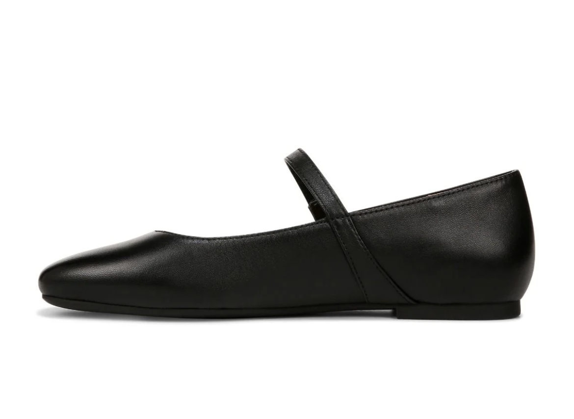 A single black leather Vionic Alameda  Mary Jane flat shoe with a rounded toe and a single strap across the instep, shown in profile against a plain white background.