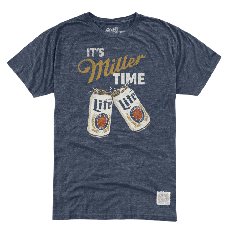 A heather navy blue t-shirt featuring a graphic print that reads 'IT'S Miller TIME' in white and gold lettering, above two clinking Miller Lite beer cans. The shirt is displayed flat against a solid white background.