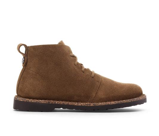 Birkenstock Uppsala Mid Boot in Dark Tea with suede upper and shearling lining, shown in profile against a white background.