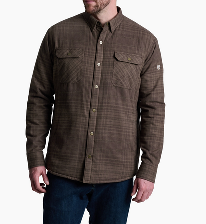 Kuhl Joyridr Brown plaid shirt worn by a person on a white background