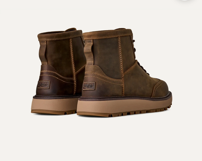 Men’s UGG Idyllwild Lace Boot in oak suede with UGGplush lining, mixed‑material upper, and a traction outsole.