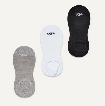 Three pairs of UGG no-show socks in black, white, and gray on a light gray background.
