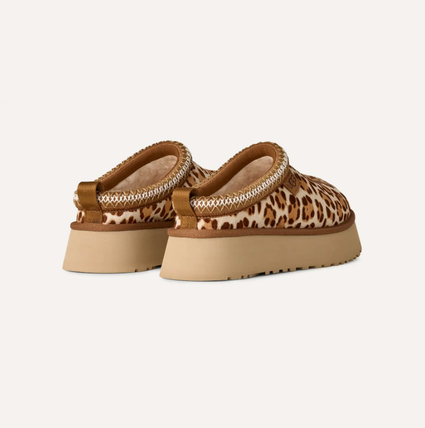 Women’s UGG Tazz Plains slipper in leopard‑print suede with plush UGGplush lining and a lightweight platform sole.