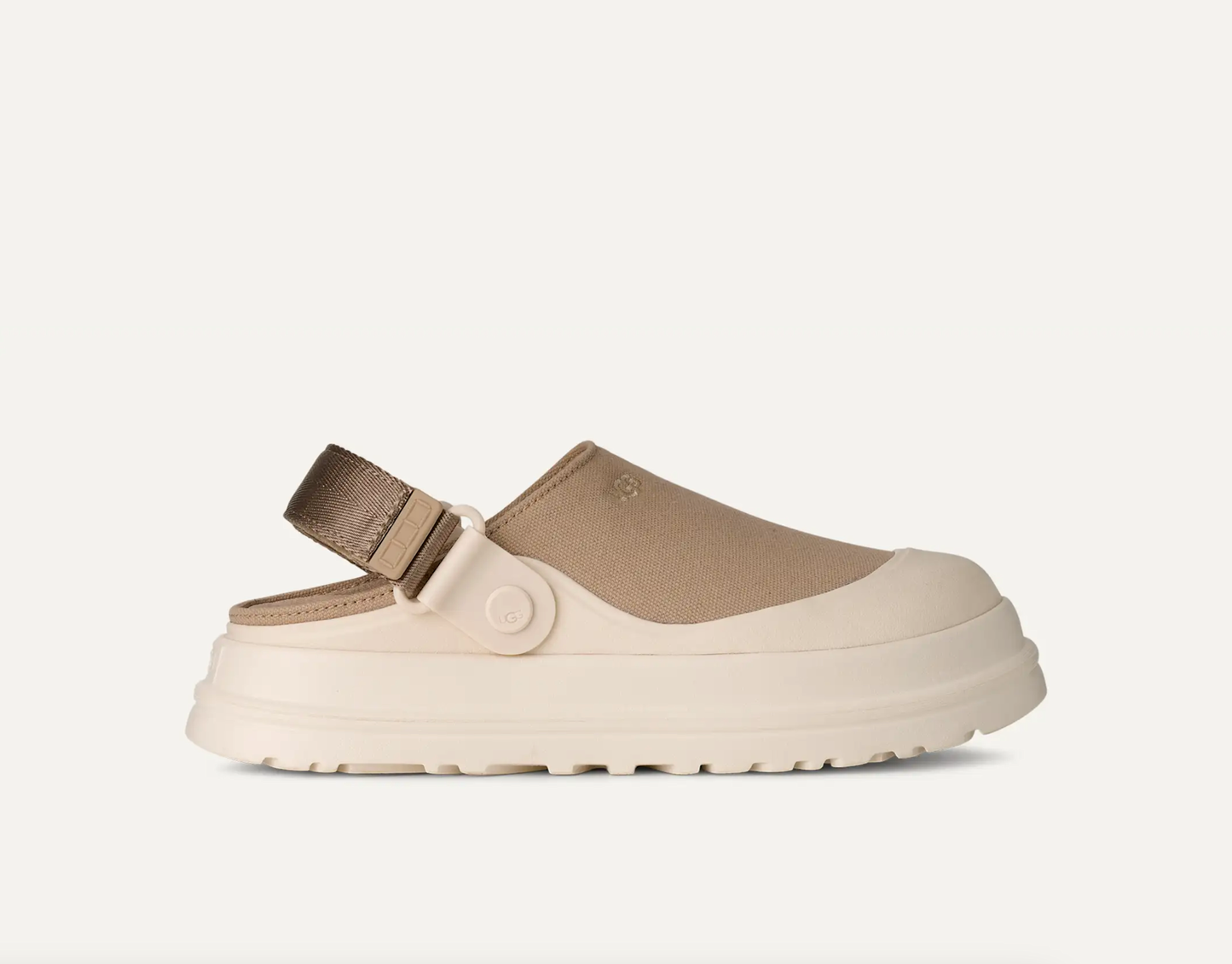 UGG Goldenglow Canvas Clog with breathable canvas upper and lightweight platform sole.