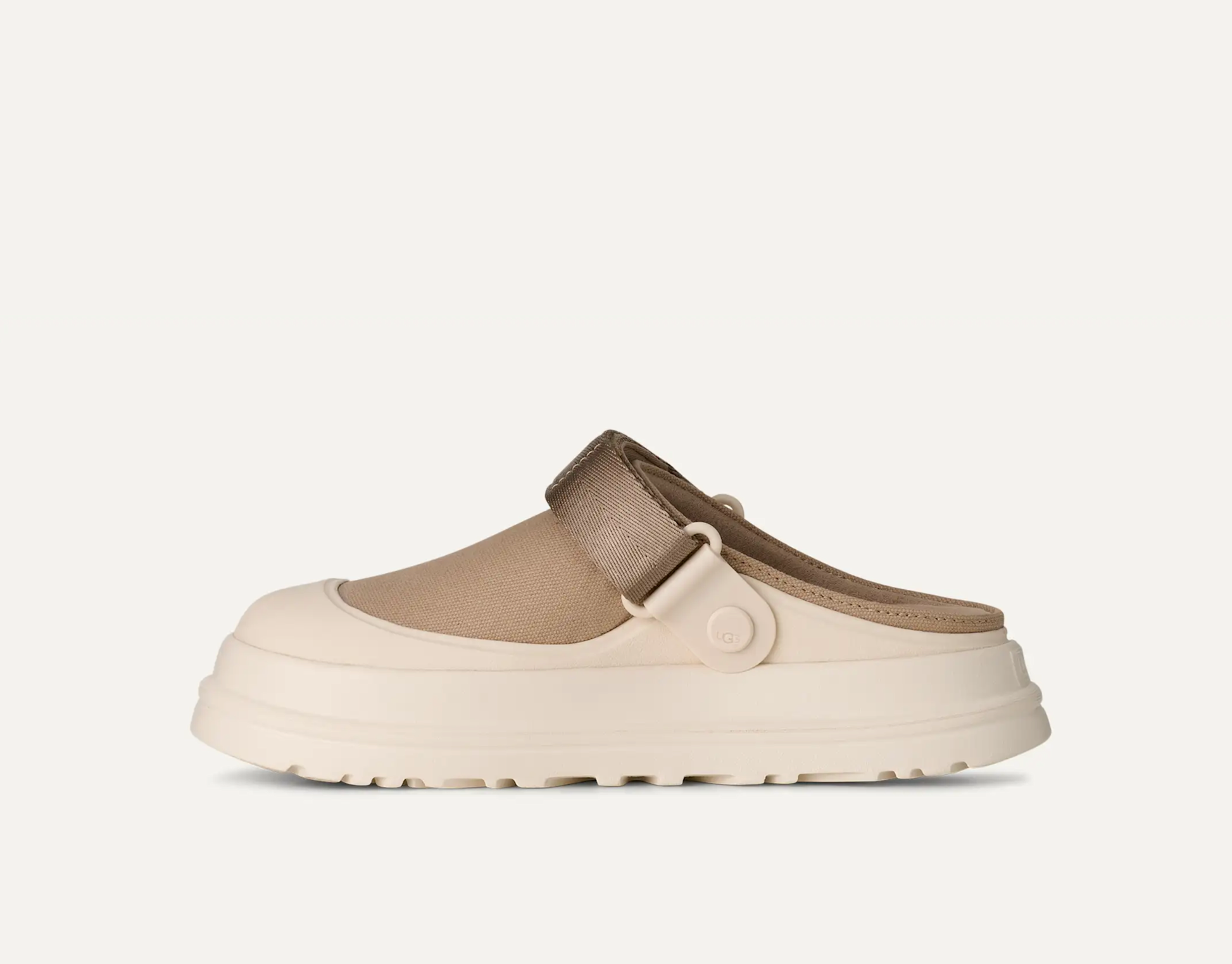 UGG Goldenglow Canvas Clog with breathable canvas upper and lightweight platform sole.